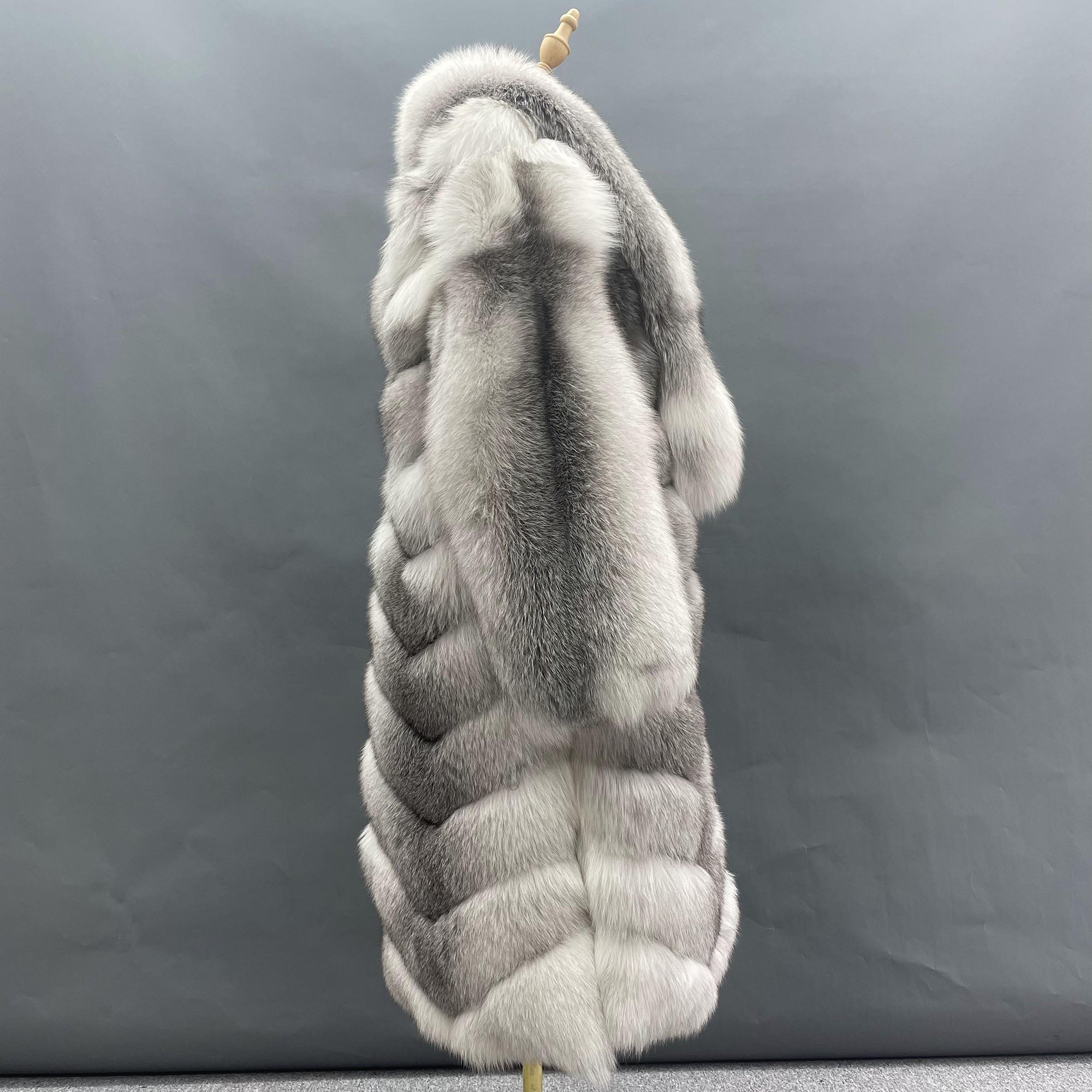 The Archive Women's Real Silver Fox Fur Long Coat - Side View showing horizontal stripe texture