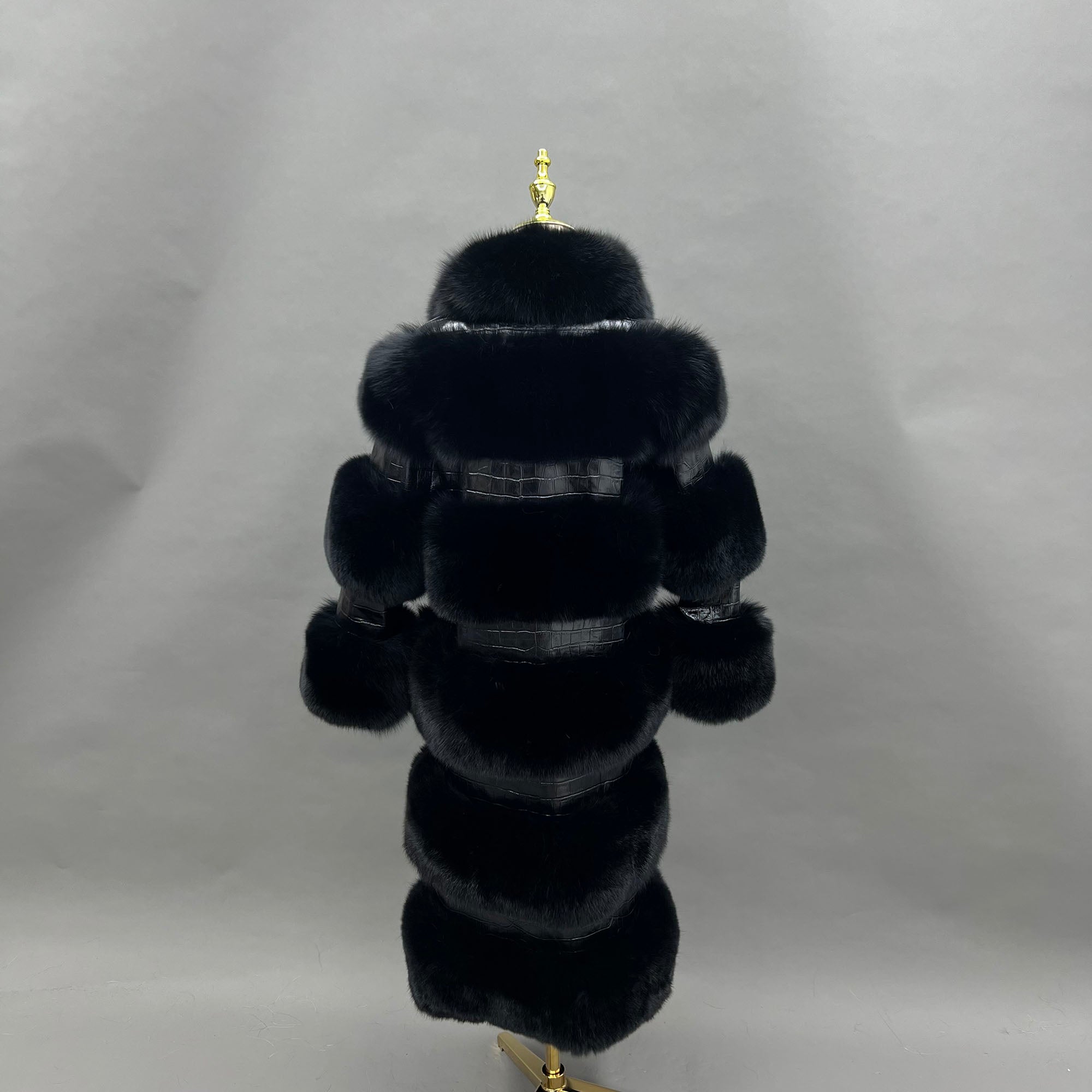 Women's fox fur leather coat — back view on mannequin