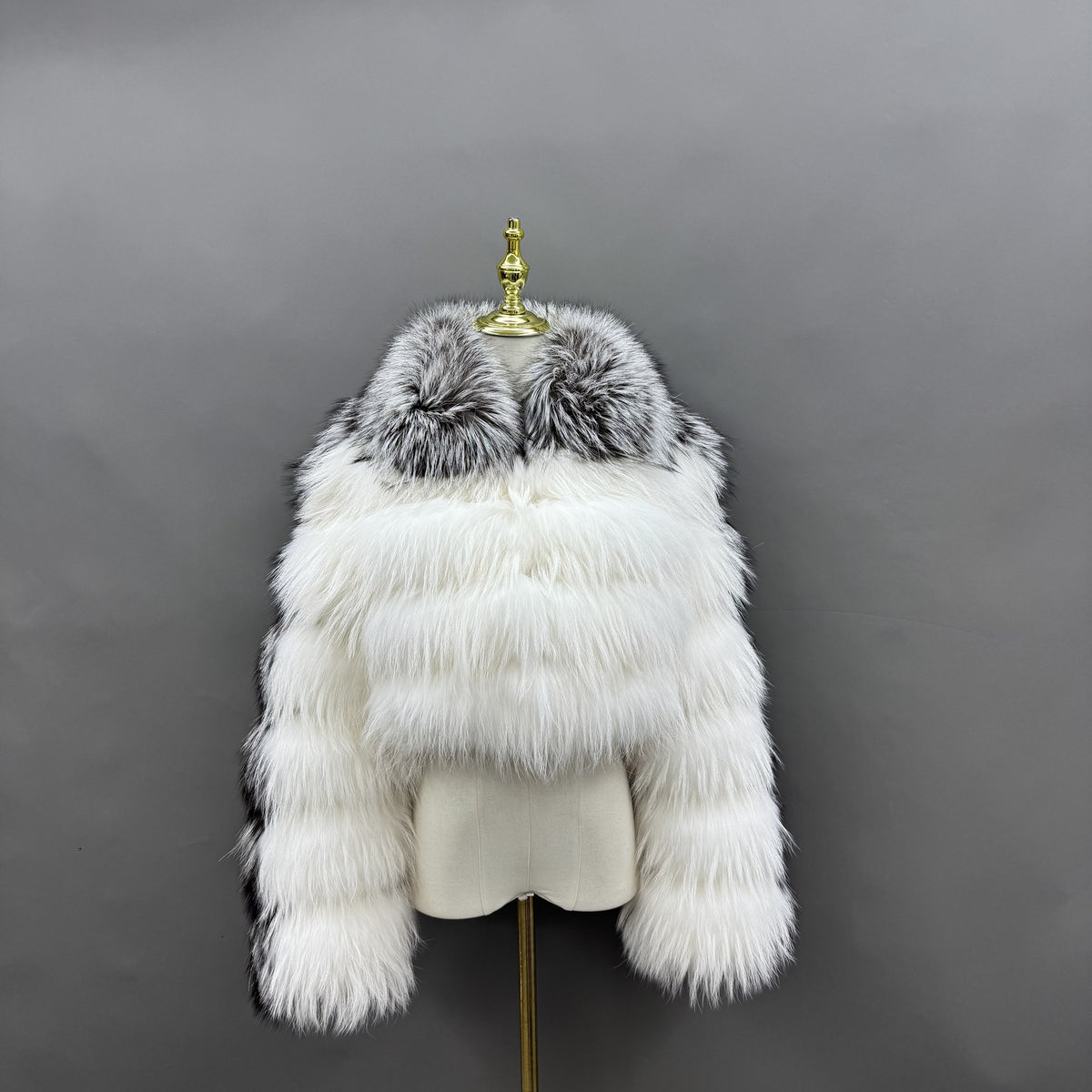 Women's white and silver-black silver fox and raccoon dog fur cropped jacket with stand collar, front view