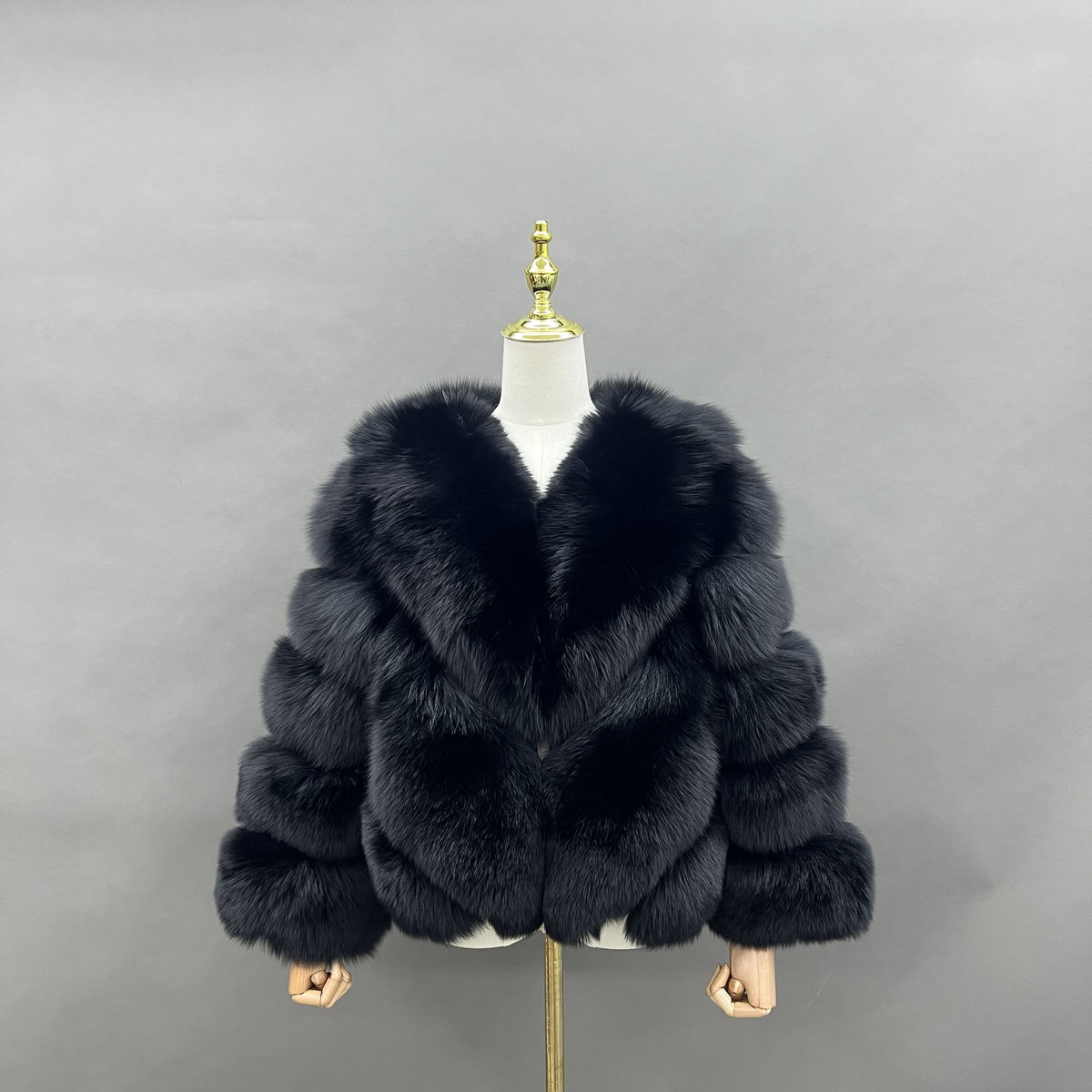 Women's black real fox fur short jacket with chevron body panels, front view