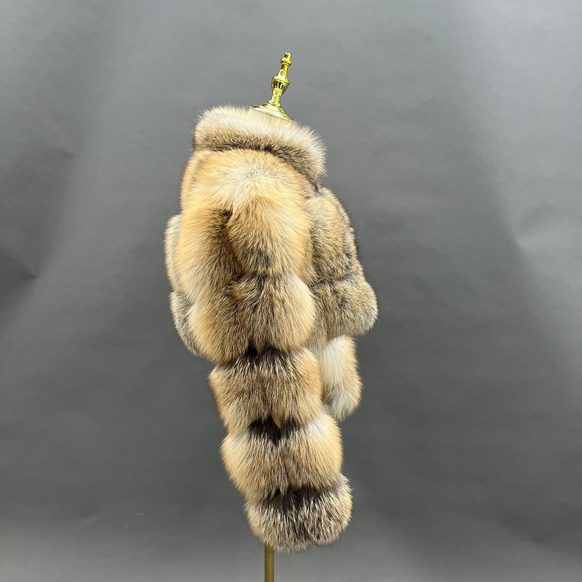 Golden fox fur puff panel cropped jacket — flat lay front view